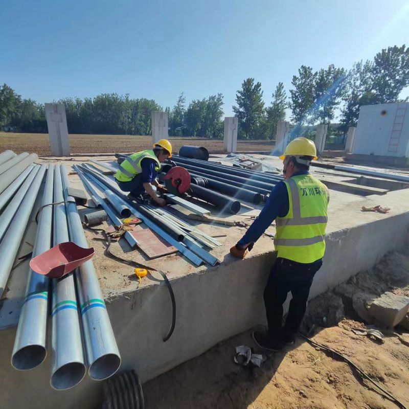 烈日高溫 萬川環保員(yuan)工奮戰工地保進度(du)